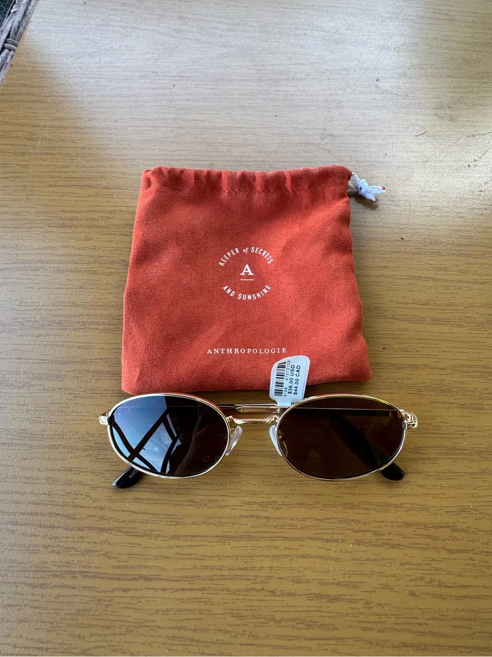 Anthropologie Gold Frame Brown Lens Oval Sunglasses